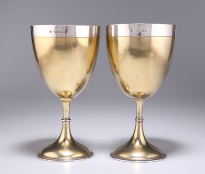 Lot 317 - A LARGE PAIR OF VICTORIAN SILVER-GILT GOBLETS