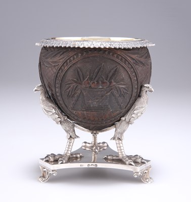 Lot 1168 - A GEORGE IV SILVER-MOUNTED CARVED COCONUT CUP