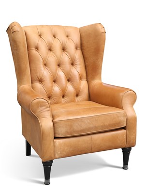 Lot 670 - A BROWN LEATHER UPHOLSTERED WING-BACK ARMCHAIR