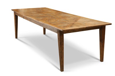 Lot 734 - A LARGE RUSTIC OAK DINING TABLE