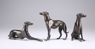 Lot 293 - THREE BRONZE MODELS OF GREYHOUNDS