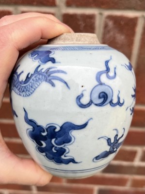 Lot 229 - A CHINESE BLUE AND WHITE DRAGON JAR