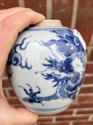 Lot 229 - A CHINESE BLUE AND WHITE DRAGON JAR