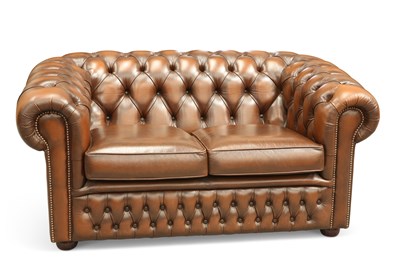 Lot 594 - A BROWN LEATHER CHESTERFIELD TWO-SEATER SOFA