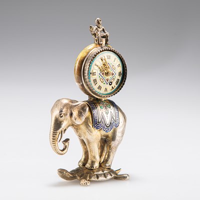 Lot 381 - A RARE MINIATURE VIENNESE SILVER-GILT AND ENAMEL ELEPHANT CLOCK, 19TH CENTURY