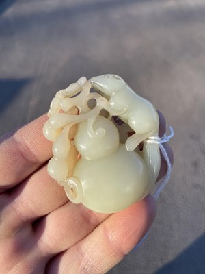 Lot 272 - A CHINESE JADE 'SQUIRREL AND GRAPES' GROUP