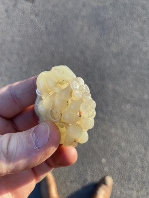 Lot 272 - A CHINESE JADE 'SQUIRREL AND GRAPES' GROUP