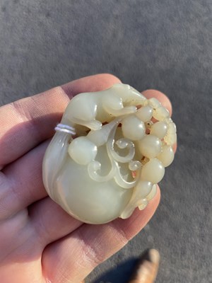 Lot 272 - A CHINESE JADE 'SQUIRREL AND GRAPES' GROUP