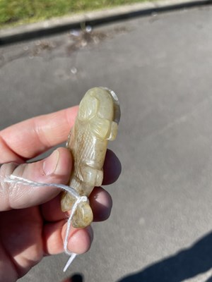 Lot 282 - A CHINESE JADE FISH PENDANT