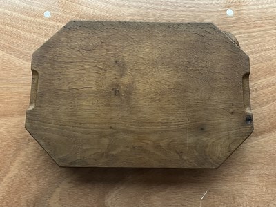 Lot 796 - ROBERT THOMPSON OF KILBURN, A MOUSEMAN OAK CHOPPING BOARD