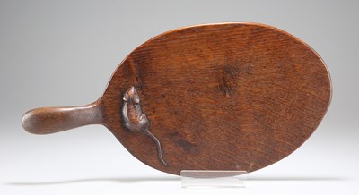 Lot 793 - ROBERT THOMPSON OF KILBURN, AN EARLY MOUSEMAN OAK CHEESEBOARD