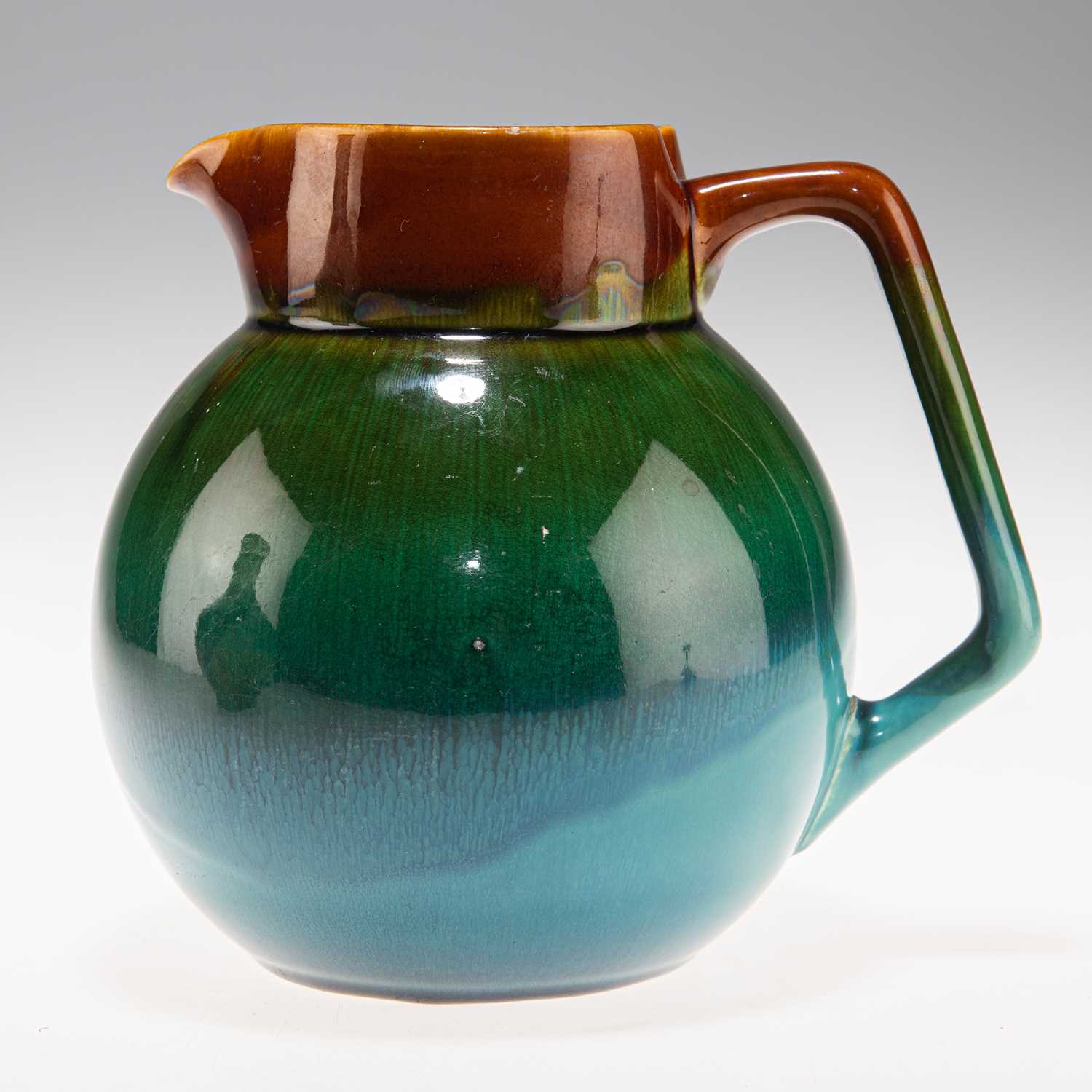 Lot 90 - CHRISTOPHER DRESSER (1834-1904) FOR LINTHORPE POTTERY, AN ART POTTERY JUG