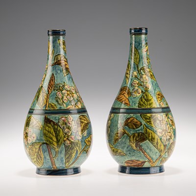 Lot 126 - HELEN A. ARDING FOR DOULTON LAMBETH, A PAIR OF LATE 19TH CENTURY FAÏENCE POTTERY BOTTLE VASES