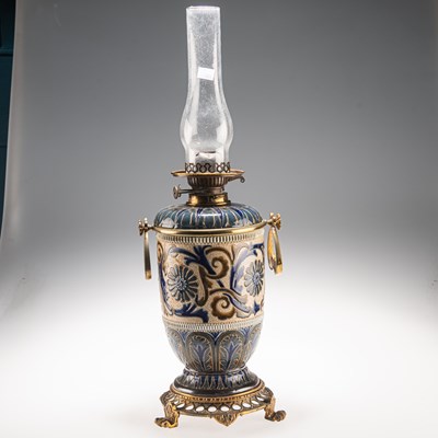 Lot 134 - EDITH D LUPTON FOR DOULTON LAMBETH, A LATE 19TH CENTURY STONEWARE OIL LAMP