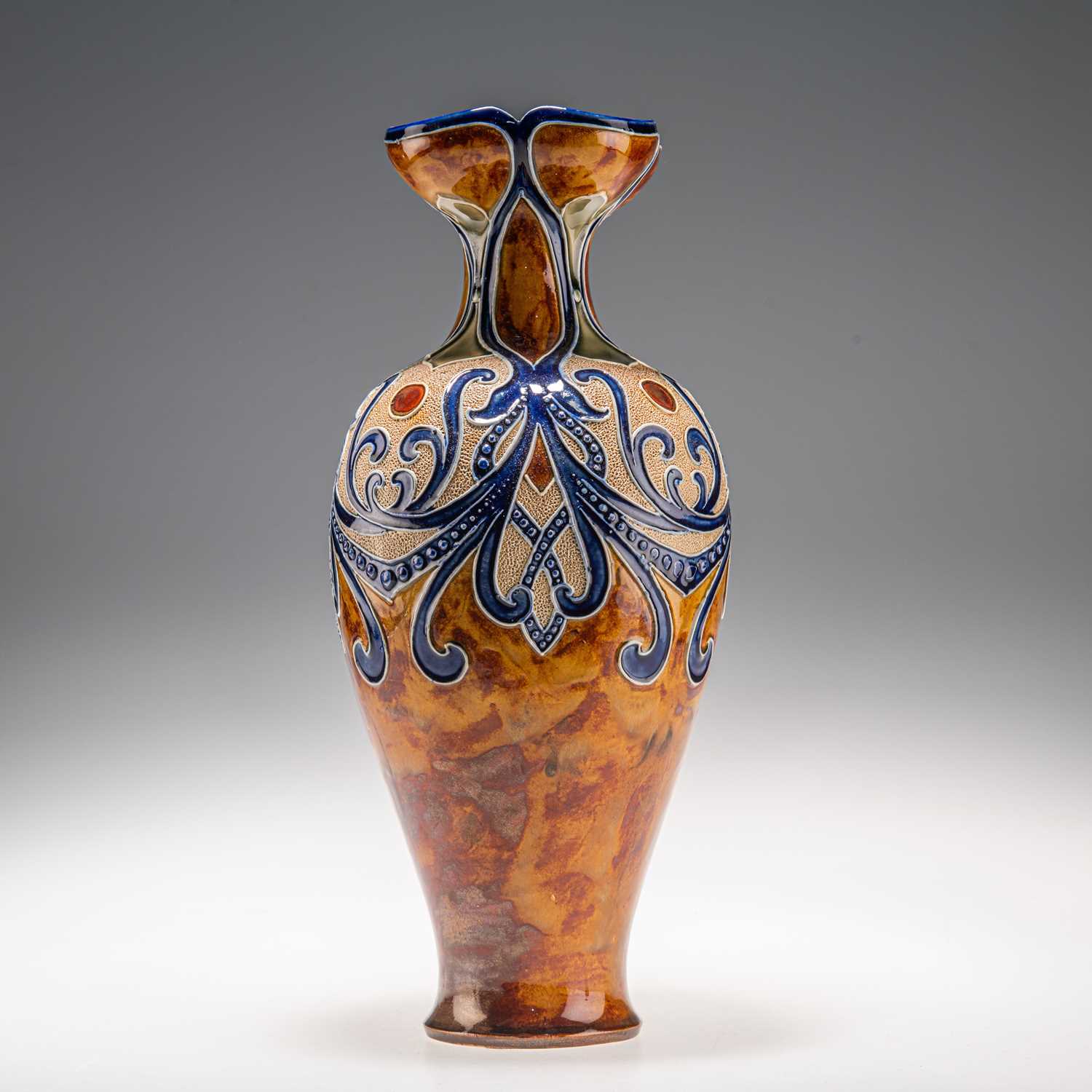 Lot 145 - FRANK A. BUTLER FOR DOULTON LAMBETH, A LATE 19TH CENTURY STONEWARE VASE