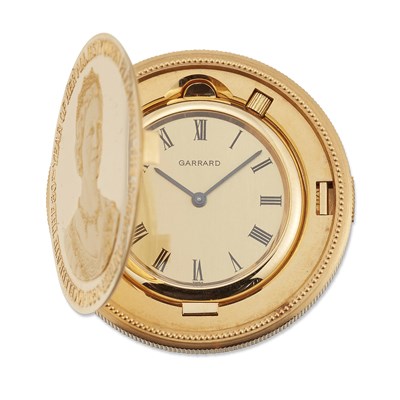 Lot 2179 - AN 18 CARAT GOLD GARRARD & CO LIMITED EDITION COMMEMORATIVE COIN WATCH