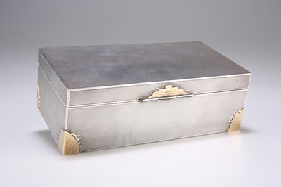 Lot 211 - AN ART DECO SILVER AND GOLD CIGARETTE BOX