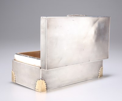 Lot 211 - AN ART DECO SILVER AND GOLD CIGARETTE BOX