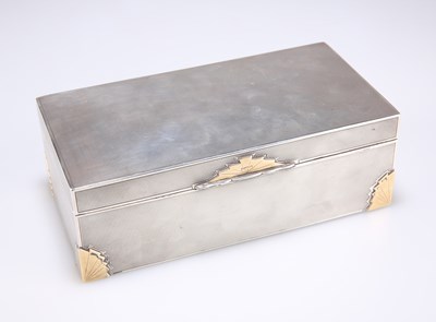 Lot 211 - AN ART DECO SILVER AND GOLD CIGARETTE BOX