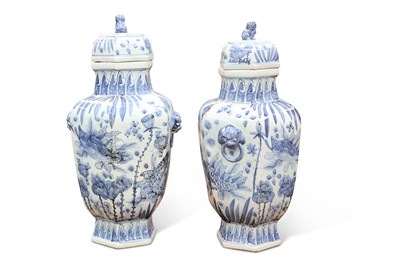 Lot 246 - A LARGE PAIR OF CHINESE BLUE AND WHITE VASES AND COVERS