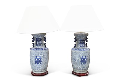 Lot 548 - A PAIR OF CHINESE BLUE AND WHITE TABLE LAMPS