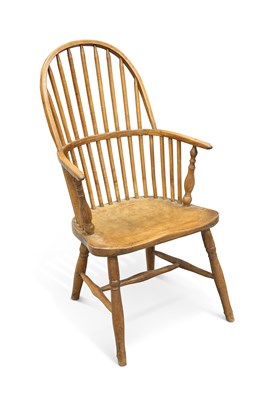 Lot 605 - A 19TH CENTURY OAK AND ELM PRIMITIVE WINDSOR ARMCHAIR