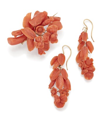 Lot 905 - A MID-19TH CENTURY CARVED CORAL BROOCH AND EARRINGS SET