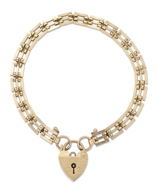 Lot 452 - A 9 CARAT GOLD GATE LINK BRACELET WITH 9 CARAT GOLD PADLOCK CLASP