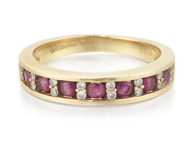 Lot 881 - AN 18 CARAT GOLD RUBY AND DIAMOND HALF HOOP RING