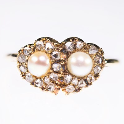 Lot 2144 - A MID-19TH CENTURY SPLIT PEARL AND DIAMOND TWIN HEART CLUSTER RING
