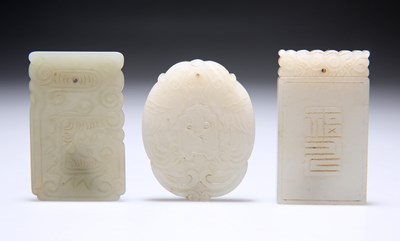 Lot 667 - THREE CHINESE JADE PENDANT PLAQUES