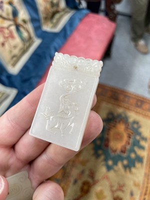 Lot 667 - THREE CHINESE JADE PENDANT PLAQUES