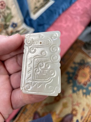 Lot 667 - THREE CHINESE JADE PENDANT PLAQUES