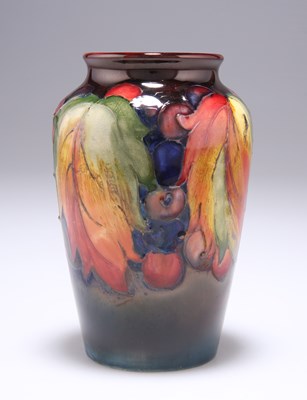 Lot 576 - A MOORCROFT FLAMBÉ 'LEAF AND BERRY' PATTERN POTTERY VASE