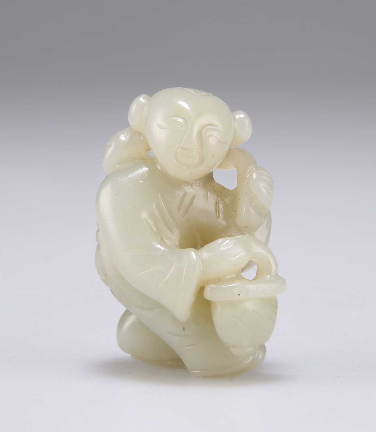 Lot 629 - A CHINESE JADE FIGURE