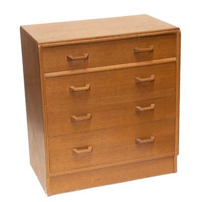 Lot 1208 - A GOMME G-PLAN OAK CHEST OF DRAWERS