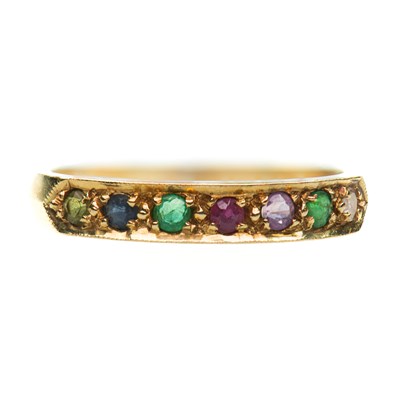 Lot 852 - A 'DEAREST' HALF HOOP RING