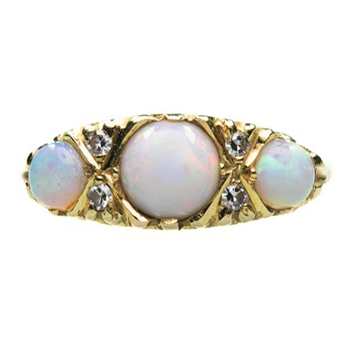 Lot 812 - AN 18 CARAT GOLD OPAL AND DIAMOND RING