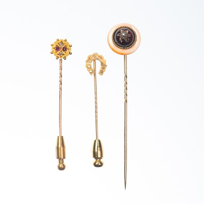 Lot 899 - THREE STICKPINS