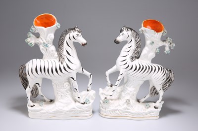 Lot 533 - A PAIR OF VICTORIAN STAFFORDSHIRE POTTERY ZEBRA SPILL VASES