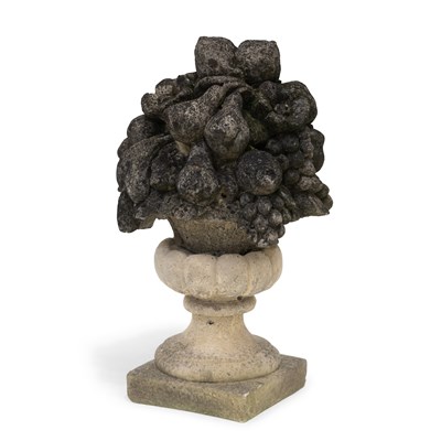 Lot 1165 - A COMPOSITE STONE FRUIT BASKET GARDEN ORNAMENT