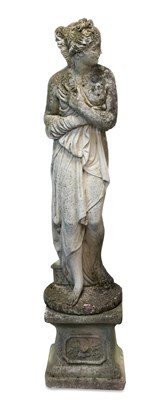 Lot 1160 - A COMPOSITE STONE GARDEN STATUE