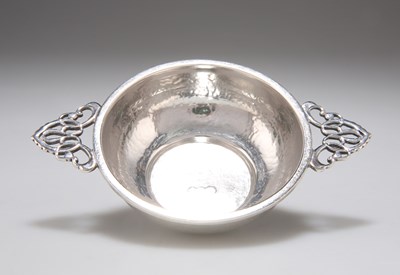 Lot 194 - SIBYL DUNLOP (1889-1968) AN ARTS AND CRAFTS SILVER QUAICH