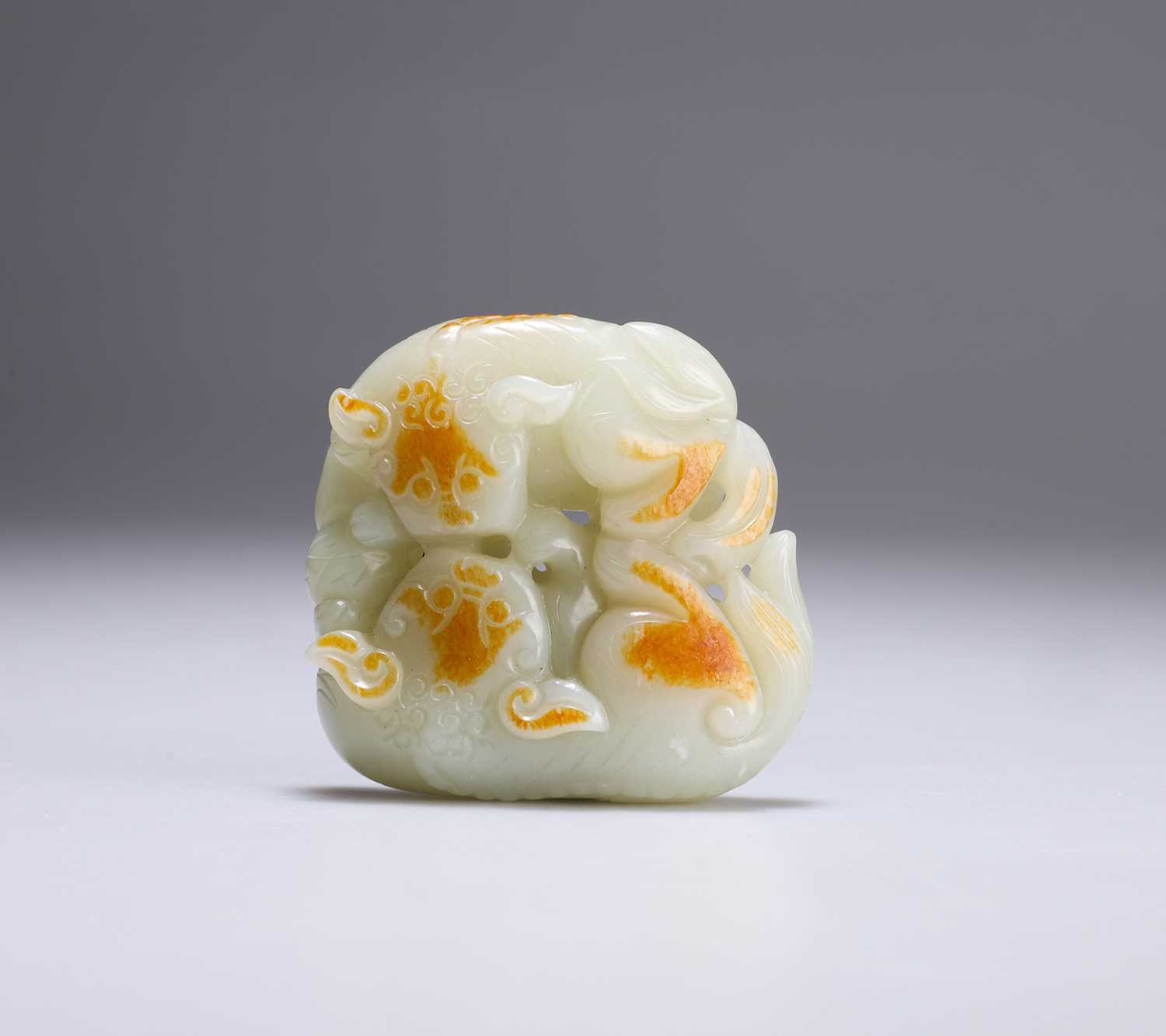 Lot 649 - A CHINESE JADE CARVING OF LION DOGS