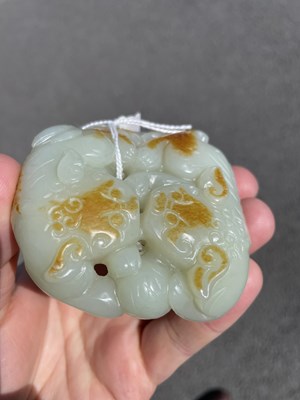 Lot 649 - A CHINESE JADE CARVING OF LION DOGS