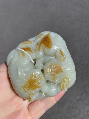 Lot 649 - A CHINESE JADE CARVING OF LION DOGS