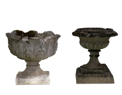 Lot 1168 - TWO COMPOSITE STONE GARDEN URNS