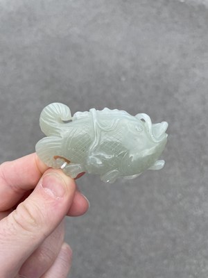 Lot 632 - A CHINESE JADE FISH PENDANT