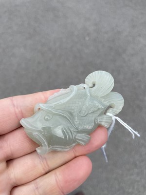 Lot 632 - A CHINESE JADE FISH PENDANT