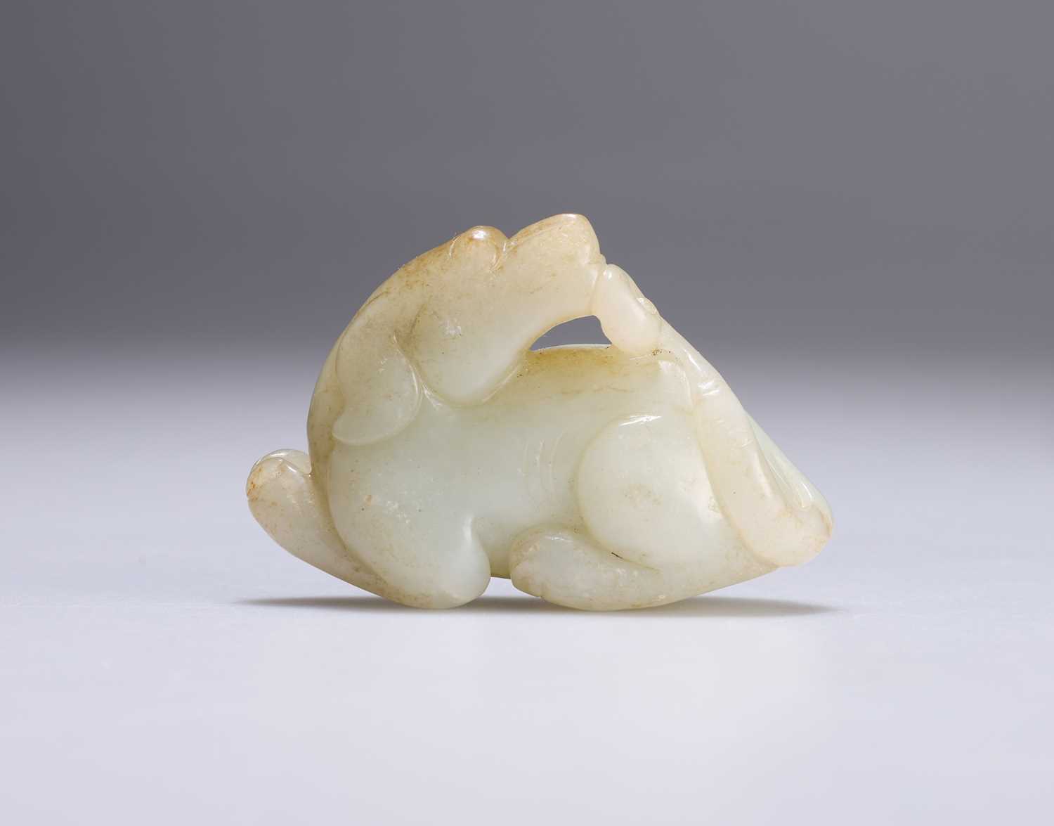 Lot 628 - A CHINESE JADE RAM CARVING